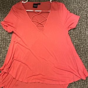 A cute pink top with laces